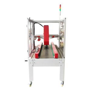 RUBBER automatische Kartonverschliessmaschine von rechts gesehen
